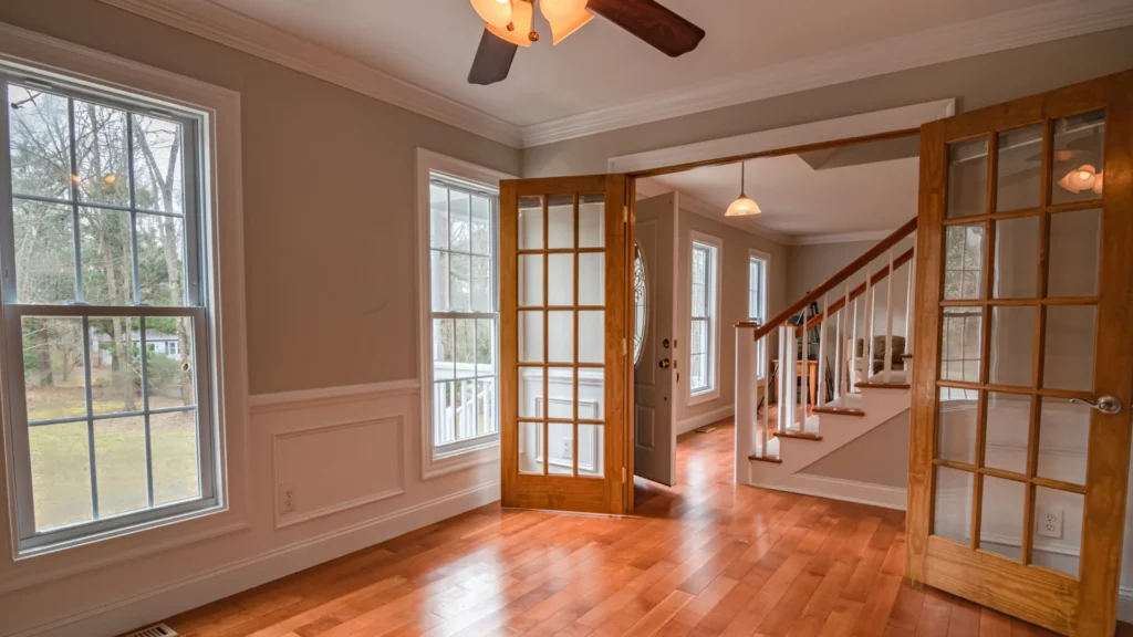 Older wood-framed glass doors ready for replacement